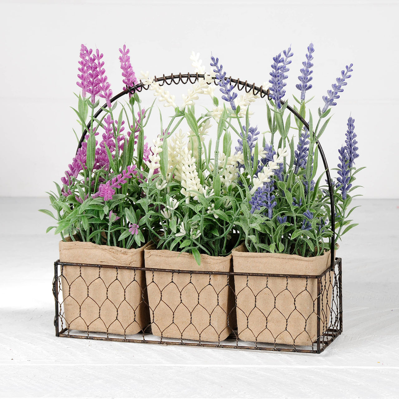 Wire Basket With Purple/White/Pink Flowers In Paper Pots